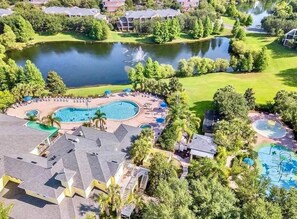 A resort with a large swimming pool, a lake, and a golf course. - Go!#33 - BAHAMA BAY - Two Bedroom Apartment, Sleeps 4 (Davenport)