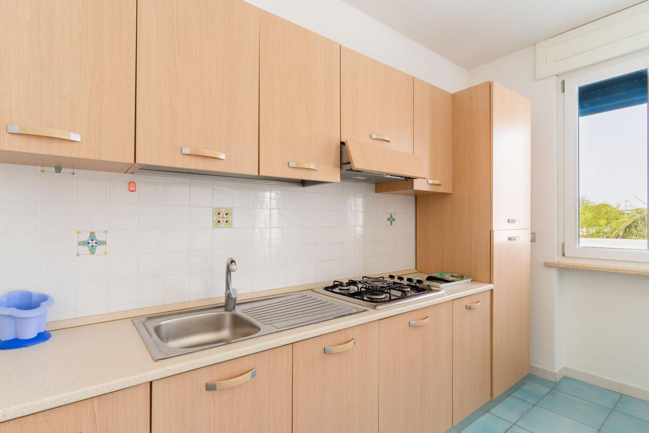 Fridge, stovetop, highchair, cookware/dishes/utensils