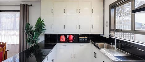 Fridge, microwave, toaster, cookware/dishes/utensils
