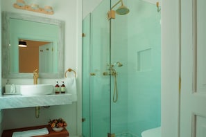 Shower, hair dryer, towels, soap