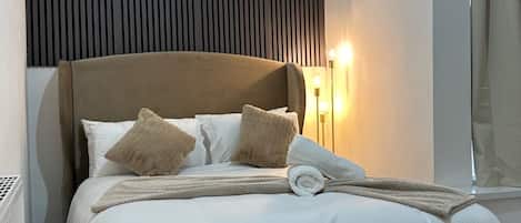 Iron/ironing board, travel crib, free WiFi, bed sheets