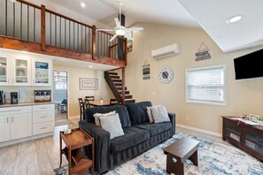 Living Room | Sectional Sofa | Ceiling Fan & Loft View - Waterfront Oasis w Beach, Dock & Kayaks! (Rome City)