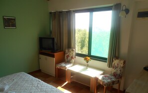 Lägenhet Economy - utsikt mot trädgården