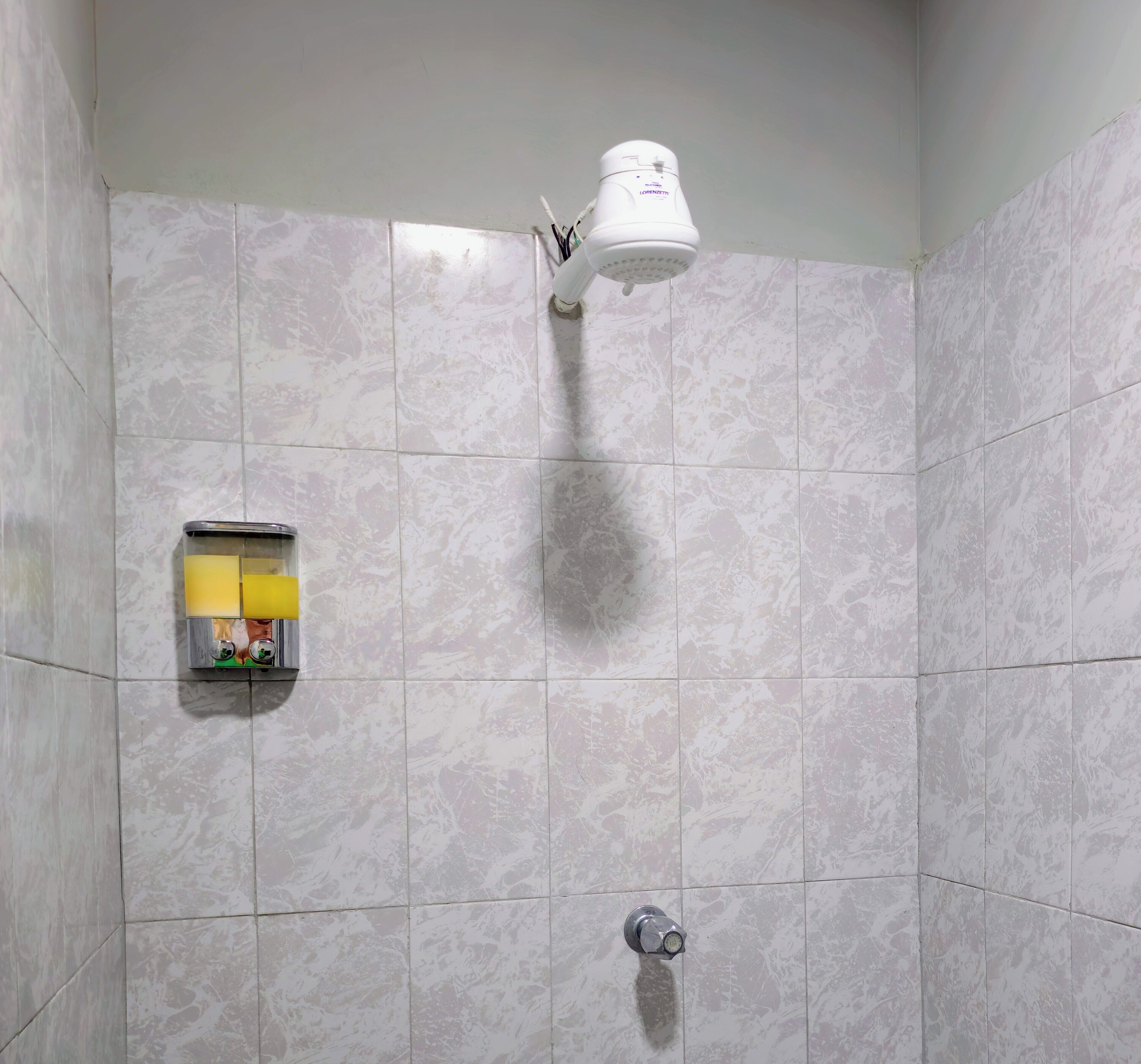 Doccia, asciugacapelli, asciugamani, sapone