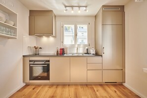 Premium Apartment, 3 Bedrooms | Private kitchen - Stay Switzerland Hotel & Apartments (Unterseen)