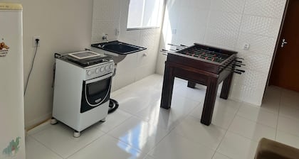 Small house with pool and barbecue.