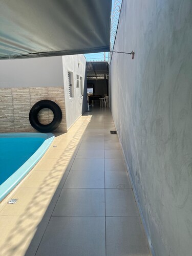 Small house with pool and barbecue.