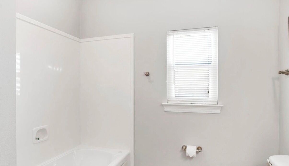 Shower, jetted tub, hair dryer, towels