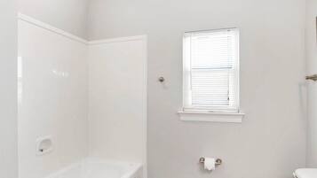 Shower, jetted tub, hair dryer, towels