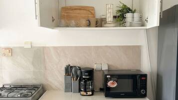 Fridge, microwave, oven, coffee/tea maker