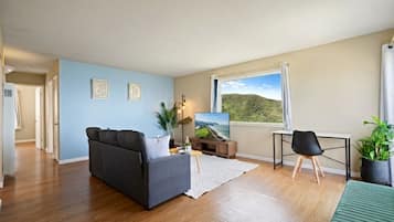 Family Apartment, 2 Bedrooms, Balcony, Ocean View | Living area | 55-inch flat-screen TV with digital channels