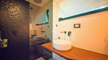 Shower, towels, soap, toilet paper