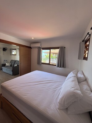 Bungalow superior, vistas a la playa | Tabla de planchar con plancha y wifi gratis