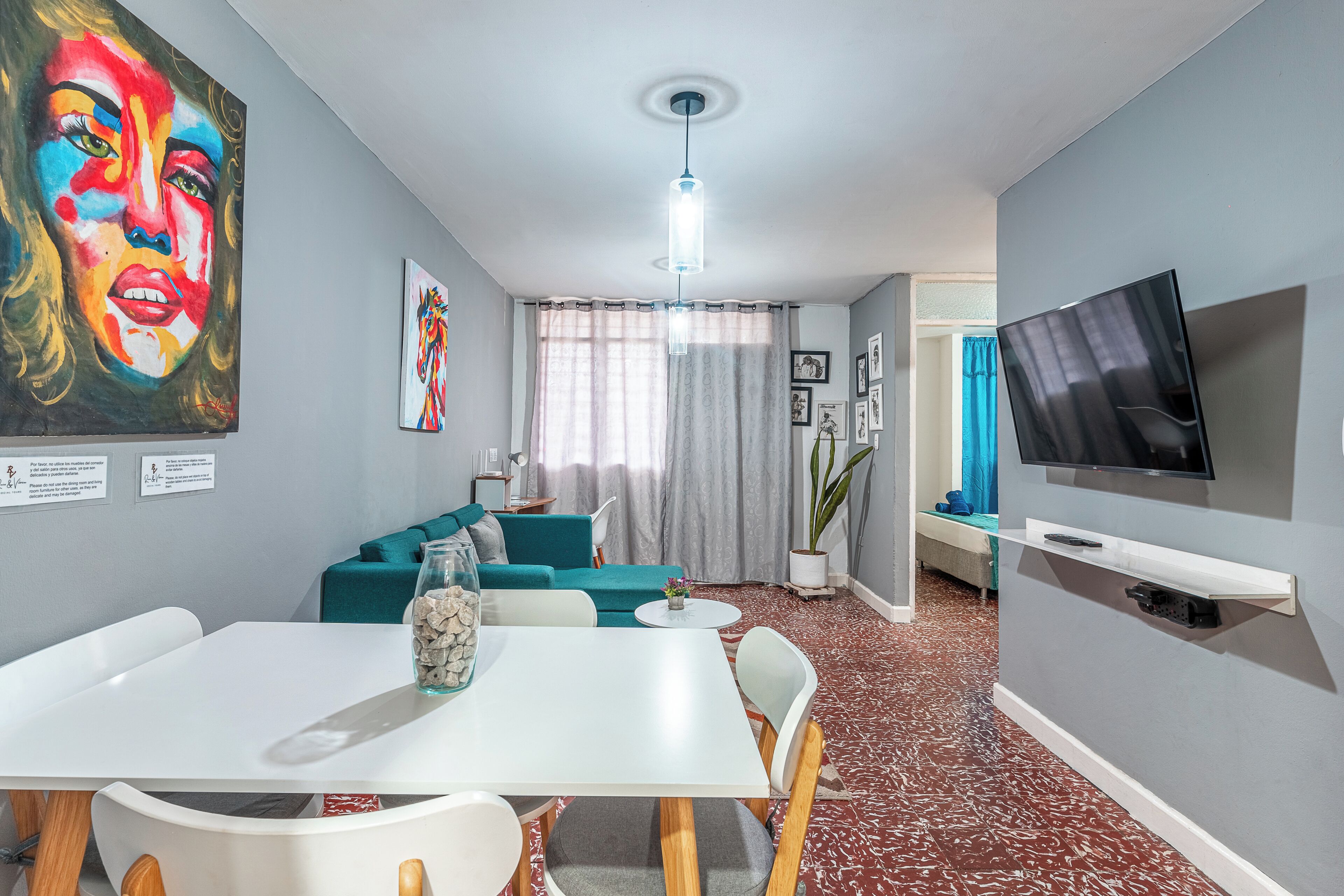 Apartment, 2 Bedrooms, Balcony, City View | Living area | 42-inch flat-screen TV with satellite channels, books