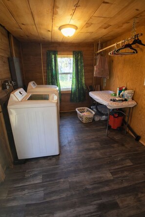 Shower, towels, soap, toilet paper