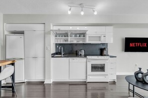 Family Double or Twin Room, Balcony, City View | Private kitchen - The Sventy hotel - Free Parking (Toronto)