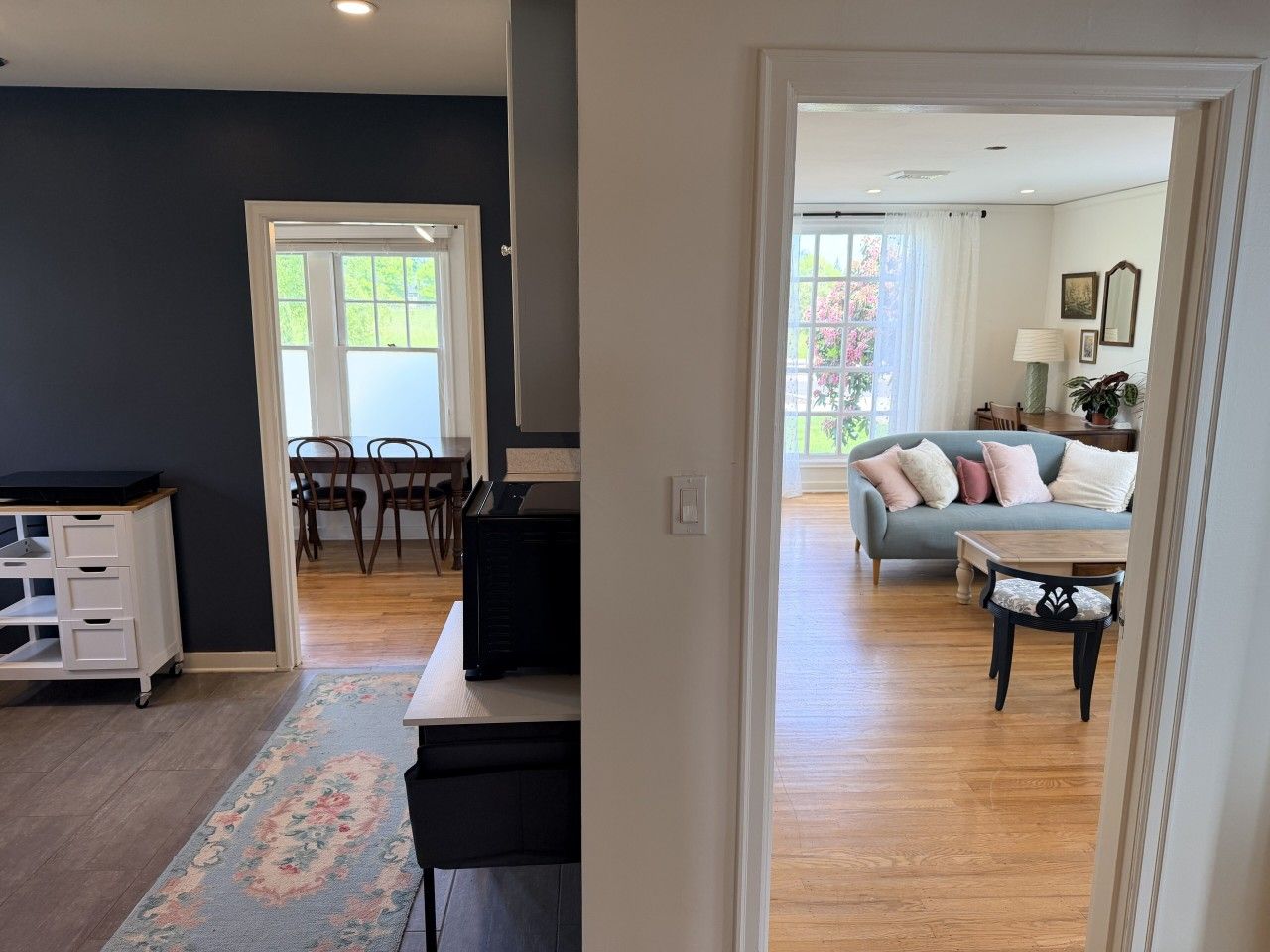 Kitchen to dining to living room. Easy flow from coffee to Pinot