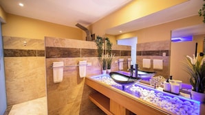 A modern bathroom with a glass basin, marble tiles, and a towel rack. - Luxury 6 Bedroom Villa in Sosua Beachfront Bliss Awaits (Sosúa)