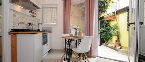 Fridge, microwave, cookware/dishes/utensils