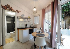 Fridge, microwave, cookware/dishes/utensils