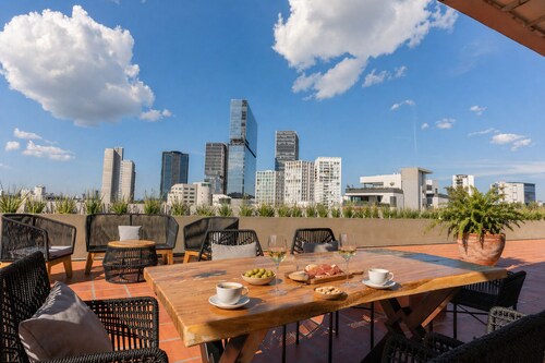 Cama King · rooftop bar · Country Club Guadalajara · limpieza diaria