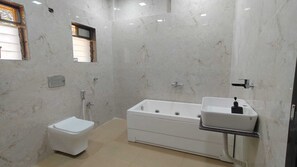 Family Quadruple Room, Pool View | Bathroom - NS Dosti Villa By Glitz (Karjat)