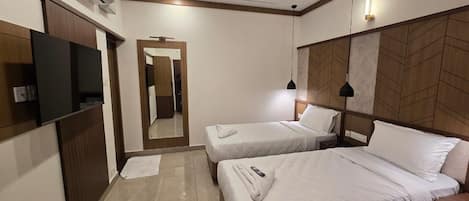 Habitación Deluxe | Sábanas de algodón egipcio, ropa de cama de alta calidad y wifi gratis