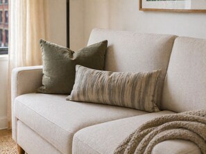 Quarto luxo, vista para a cidade | Área de estar