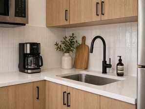 Quarto luxo, vista para a cidade | Cozinha privada