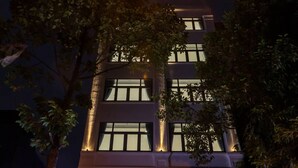 A hotel with a sign reading 'BIN BIN HOTEL' and 'Your Second Home.' - Bin Bin Hotel 18 - Near Thu Thiem Villa Park (Ho Chi Minh City)
