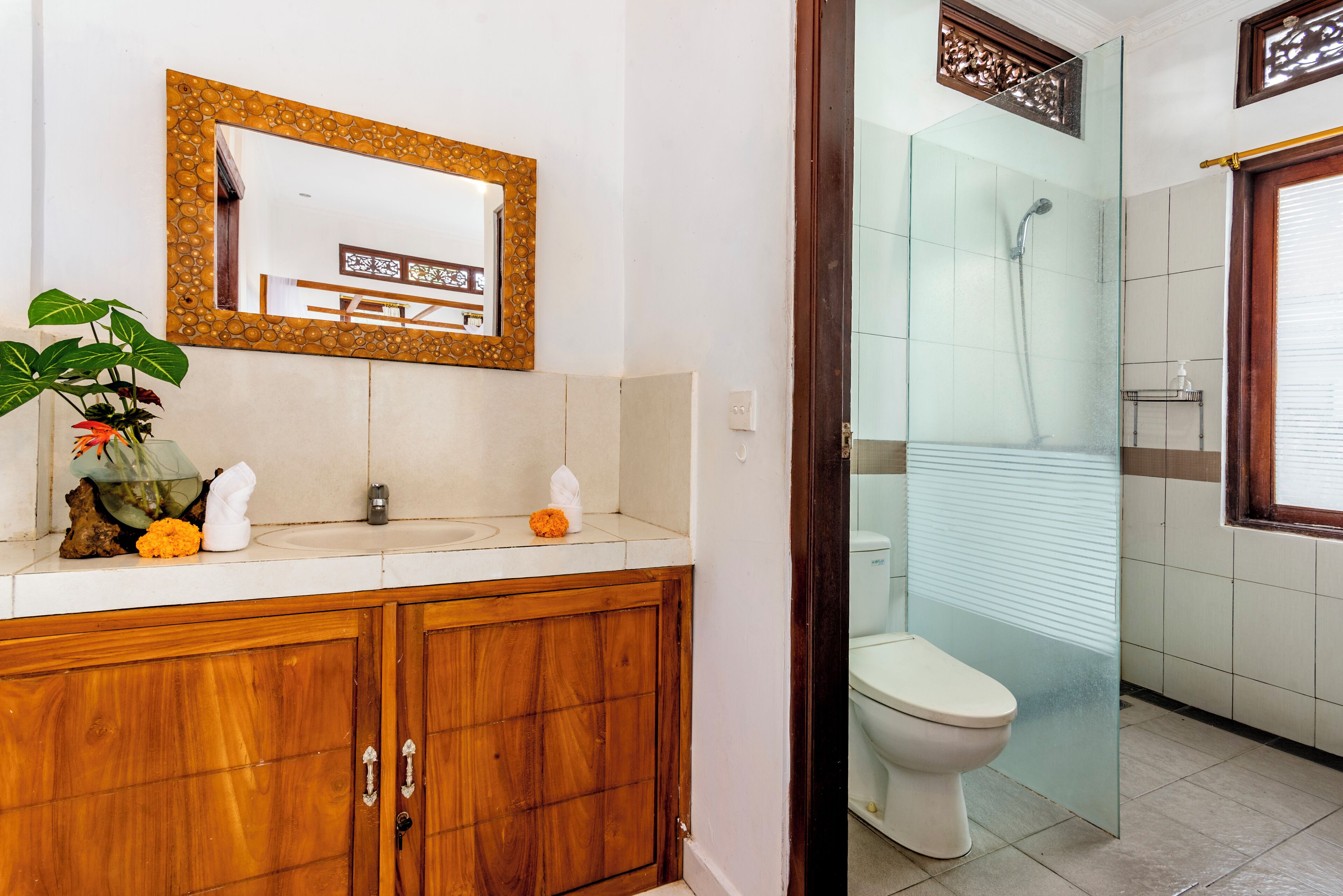 Shower, hair dryer, towels, soap