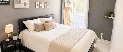 2 habitaciones, tabla de planchar con plancha, internet y ropa de cama