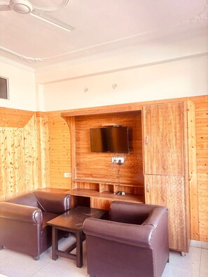 Quarto luxo | Área de estar