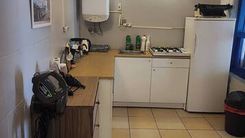 Fridge, stovetop, cookware/dishes/utensils