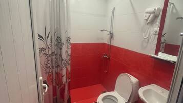 Shower, jetted tub, hair dryer, bidet
