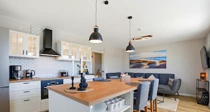 Carina - Carina vacation apartment in Norddeich with balcony and WLAN for up to 4 people