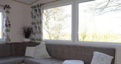 Cozy chalet with a view over the fields