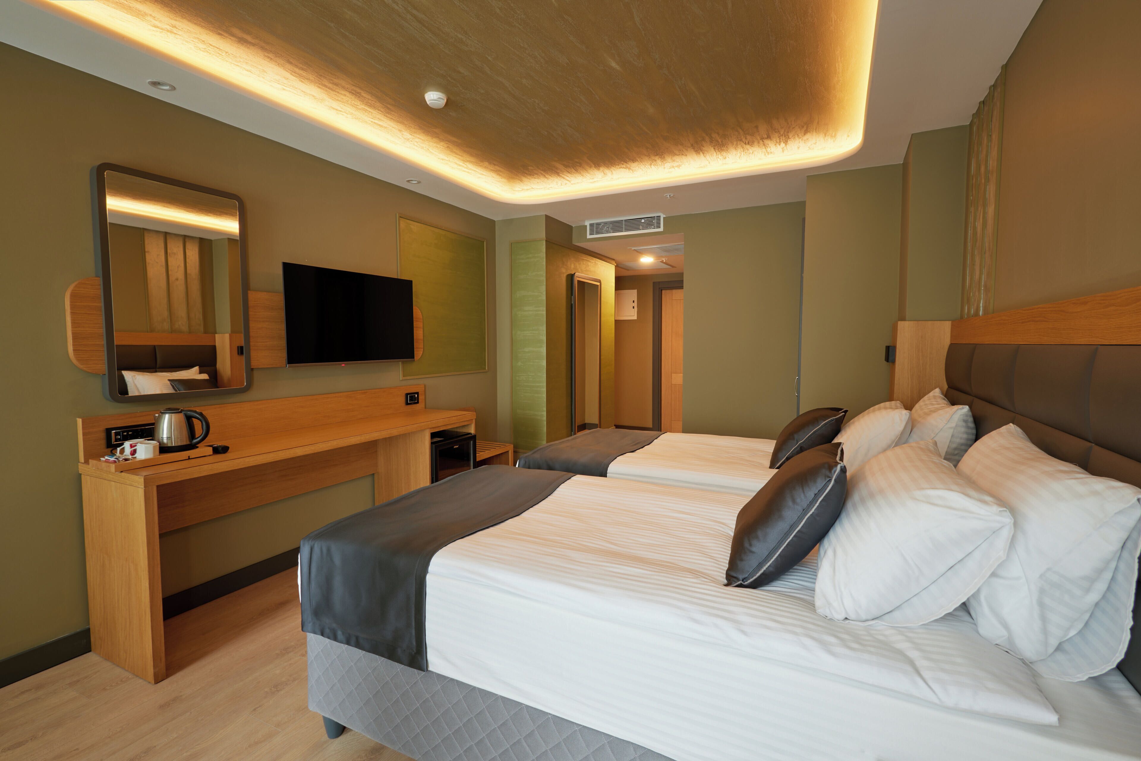 Deluxe fyrbäddsrum - utsikt mot staden