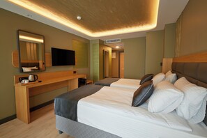 Deluxe fyrbäddsrum - utsikt mot staden