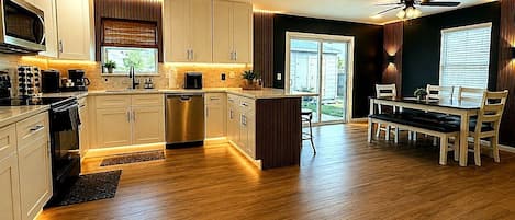 Coffee/tea maker, fridge, microwave, oven