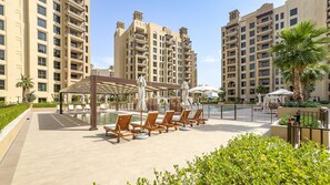 Pool - Chic 2BR Retreat with Assistant Room, Short Minutes Drive to MOE and the Beach (Dubai)