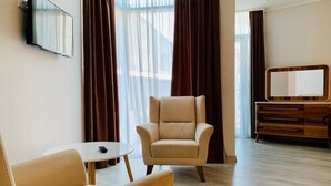 Tremannsrom – deluxe | Oppholdsområde