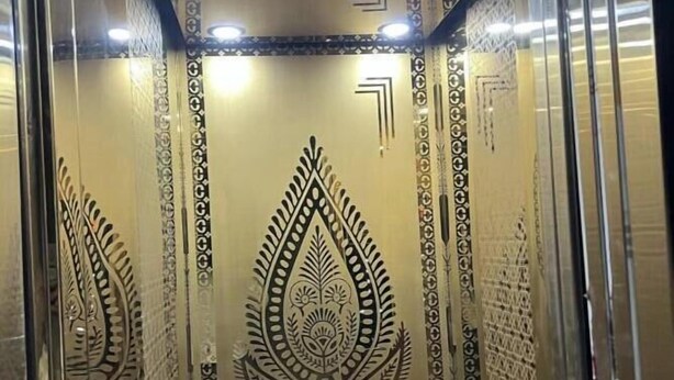An elevator with patterned walls and a central decorative motif. - Hotel Prime Stay (New Delhi)