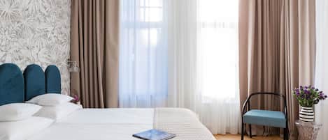 Departamento superior | Tabla de planchar con plancha, wifi gratis y ropa de cama