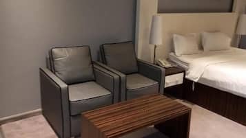 Double Room | Living area | 40-inch flat-screen TV with cable channels