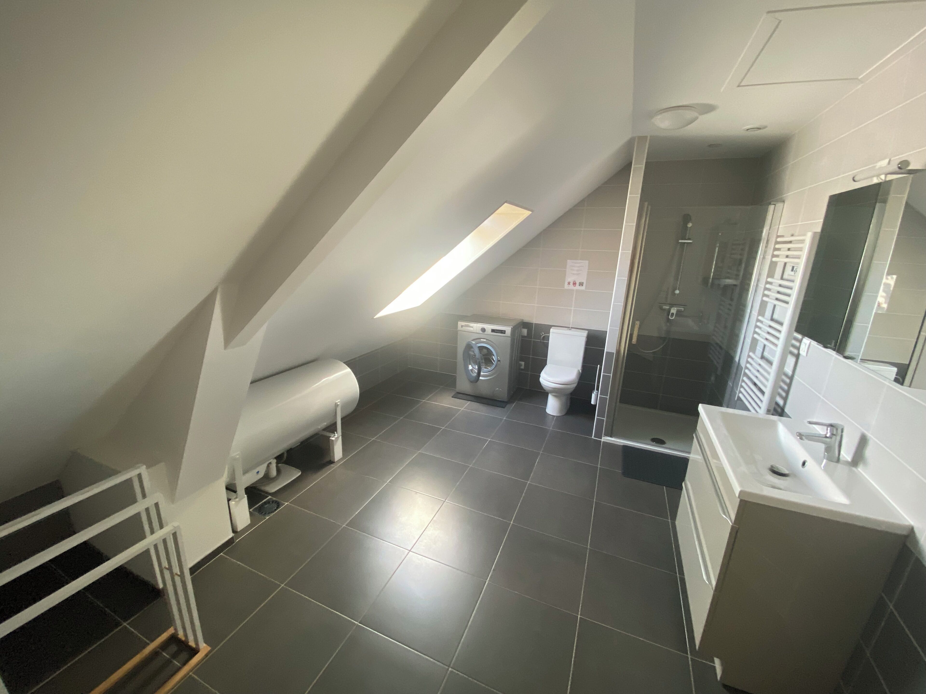 Shower, hair dryer, towels, toilet paper