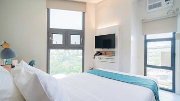 Habitación individual básica, 1 cama individual grande | Caja fuerte, escritorio, espacio para trabajar con un portátil
