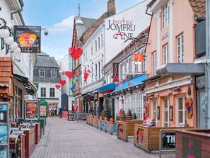 A street lined with shops and a hotel named 'Hotel Jomfru Aane.' - 2 Person Holiday Park Home in Aalborg (Aalborg)
