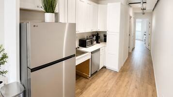 Fridge, microwave, dishwasher, coffee/tea maker