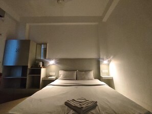 Standard Double Room, City View | Desk, laptop workspace, iron/ironing board, free WiFi
